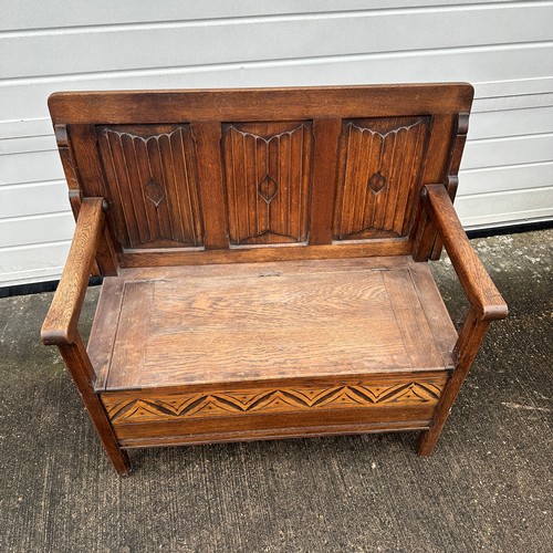 662 - Dark Oak Monks Chest. Can be used as a table or chair. H93cm x W98cm x D47cm. BUYER TO COLLECT OR AR... 