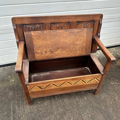 662 - Dark Oak Monks Chest. Can be used as a table or chair. H93cm x W98cm x D47cm. BUYER TO COLLECT OR AR... 