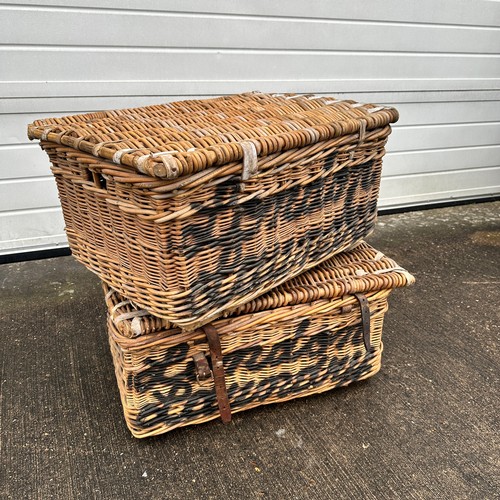 669 - Two Large Wicker Baskets. London Laundry. Leather fastening straps. H31cm x W69cm x D48cm. Qty 2. BU... 