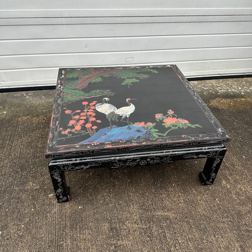 666 - Black Oriental Lacquered Low Table. Decorated with Japanese Cranes with a floral scene. H38cm x W90c... 