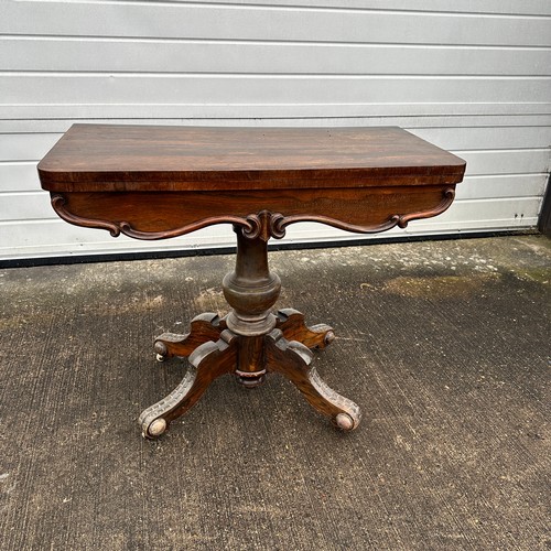 668 - Mahogany Card Table. Table top over centre column on 4 feet, with castors. W90.5cm x H76.5cm x D44.5... 