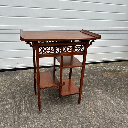 667 - Mahogany Anglo Japanese Occasional Table. Aesthetic movement style. Graduated shelves. H74cm x W64cm... 