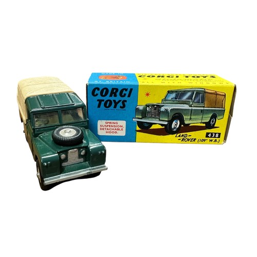 70 - Corgi Land Rover 109LWB dark green, tan plastic tilt, metal tow hook No. 438, generally excellent in... 