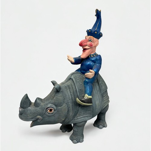 3 - Terry Webster (British, 1941-2024), 
Mr Punch on Rhino, 
Composite resin, 
41cm.