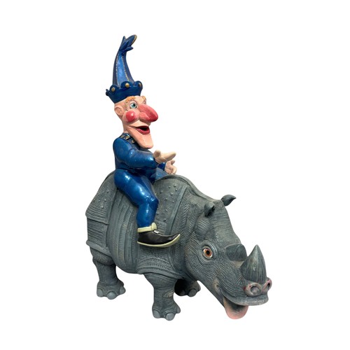 3 - Terry Webster (British, 1941-2024), 
Mr Punch on Rhino, 
Composite resin, 
41cm.