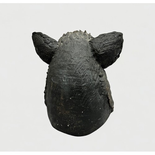 33 - Terry Webster (British, 1941-2024), 
Boars Head, 
Paper mâché, 
37cm.