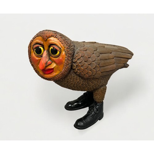 61 - Terry Webster (British, 1941-2024), 
Owl in Boots, 
Composite resin, 
29cm.