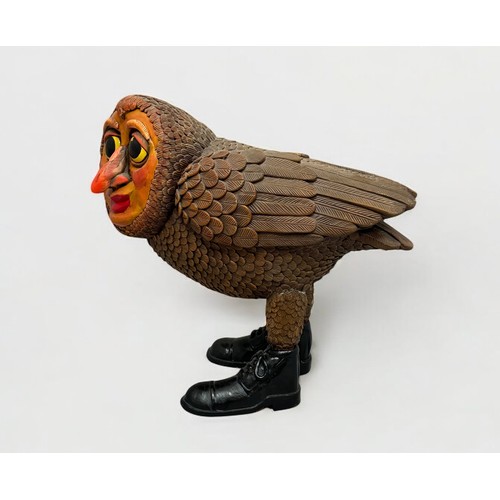 61 - Terry Webster (British, 1941-2024), 
Owl in Boots, 
Composite resin, 
29cm.