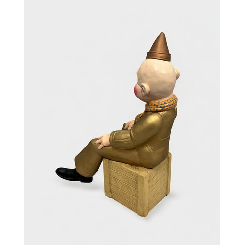 14 - Terry Webster (British, 1941-2024), 
Seated Clown, 
Composite resin, 
43cm.