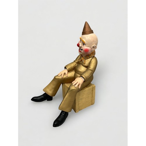 14 - Terry Webster (British, 1941-2024), 
Seated Clown, 
Composite resin, 
43cm.