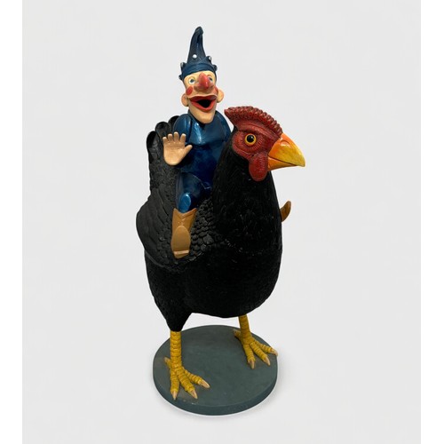 5 - Terry Webster (British, 1941-2024), 
Mr Punch on Chicken, 
Composite resin, 
53cm.