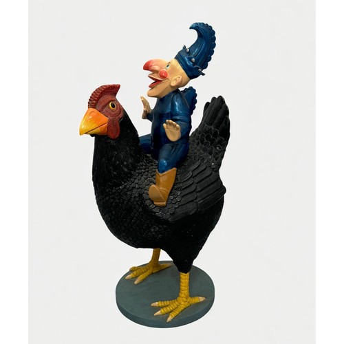 5 - Terry Webster (British, 1941-2024), 
Mr Punch on Chicken, 
Composite resin, 
53cm.