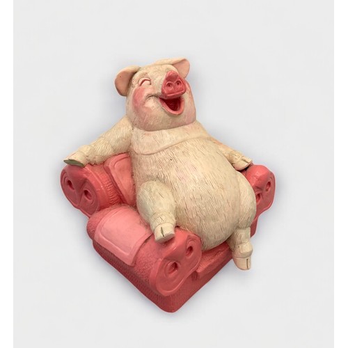 36 - Terry Webster (British, 1941-2024),
Pig on Chair, 
Composite resin, 
19cm.