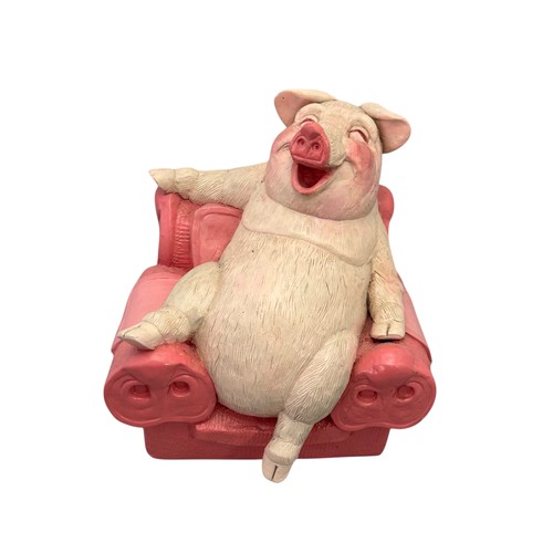 36 - Terry Webster (British, 1941-2024),
Pig on Chair, 
Composite resin, 
19cm.