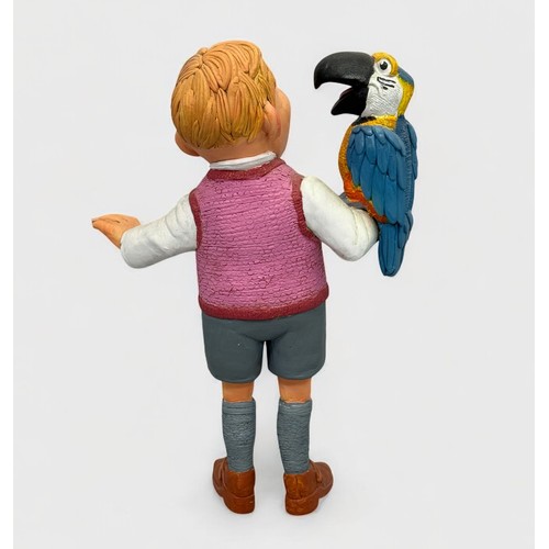 18 - Terry Webster (British, 1941-2024), 
Boy with Parrot, 
Composite resin, 
35cm.