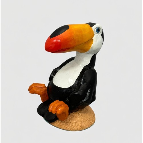 60 - Terry Webster (British, 1941-2024), 
Seated Toucan, 
Composite resin, 
24cm.