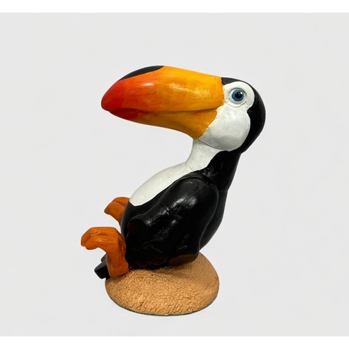 60 - Terry Webster (British, 1941-2024), 
Seated Toucan, 
Composite resin, 
24cm.