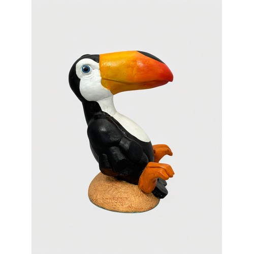 60 - Terry Webster (British, 1941-2024), 
Seated Toucan, 
Composite resin, 
24cm.