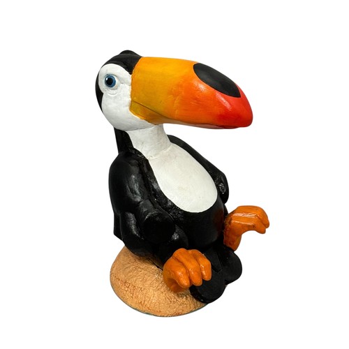 60 - Terry Webster (British, 1941-2024), 
Seated Toucan, 
Composite resin, 
24cm.