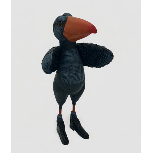 56 - Terry Webster (British, 1941-2024), 
Bird in Boots, 
Composite resin, 
37cm.