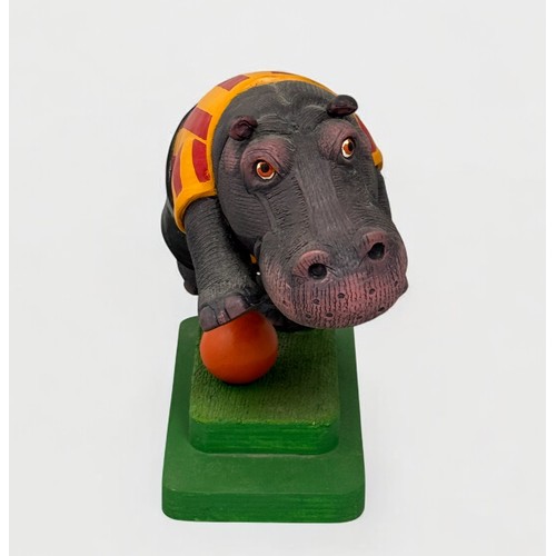 72 - Terry Webster (British, 1941-2024), 
Football Hippo, 
Composite resin on wooden plinth,
21cm.