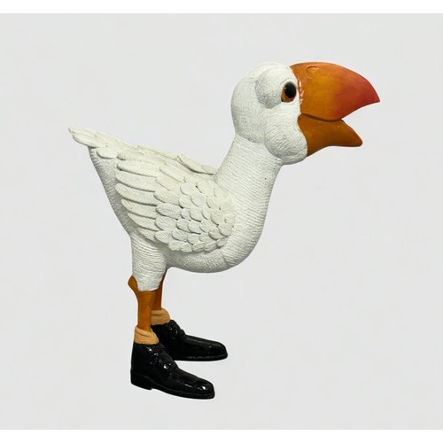 58 - Terry Webster (British, 1941-2024), 
Gull in Shoes, 
Composite resin, 
33cm.