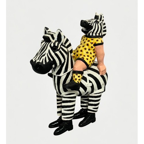 19 - Terry Webster (British, 1941-2024), 
Zebra riding Zebra, 
Composite resin, 
34cm.