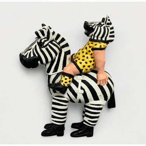 19 - Terry Webster (British, 1941-2024), 
Zebra riding Zebra, 
Composite resin, 
34cm.