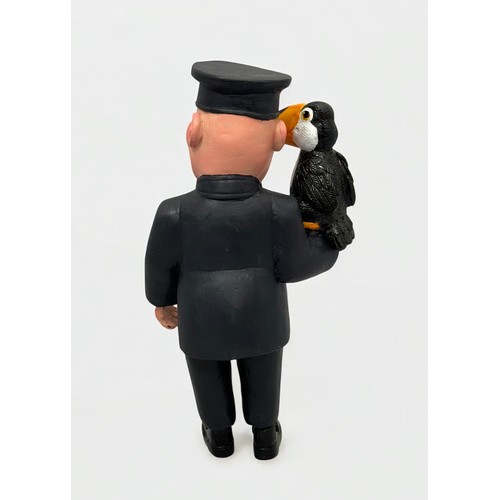 20 - Terry Webster (British, 1941-2024), 
Zookeeper with Toucan, 
Composite resin, 
38cm.