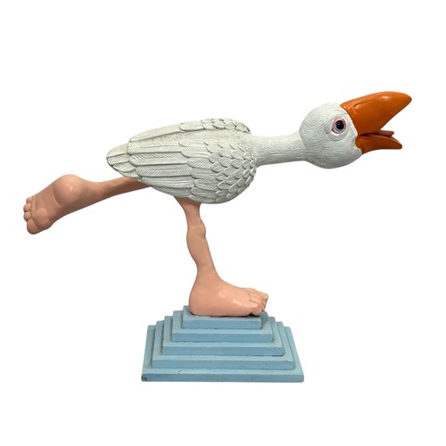 55 - Terry Webster (British, 1941-2024),
Running Bird, 
Composite resin on wooden base, 
35cm.