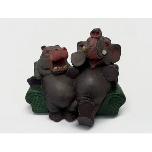 76 - Terry Webster (British, 1941-2024),
Hippo and Elephant on sofa, 
Composite resin and plaster, 
25cm.