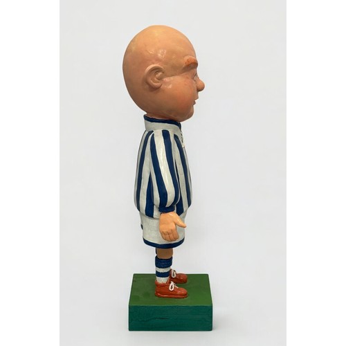 21 - Terry Webster (British, 1941-2024),
Footballer, 
Composite resin on wooden base, 
46cm