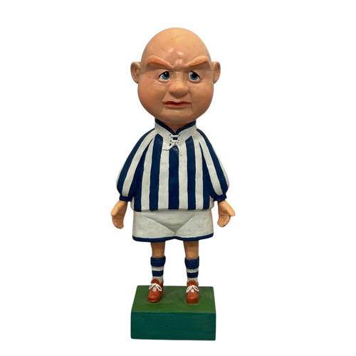 21 - Terry Webster (British, 1941-2024),
Footballer, 
Composite resin on wooden base, 
46cm