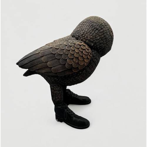 42 - Terry Webster (British, 1941-2024),
Owl in boots, 
Composite resin, 
31cm.