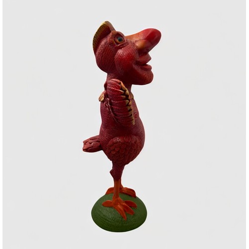 47 - Terry Webster (British, 1941-2024), 
Red bird, 
Composite resin, 
36cm.