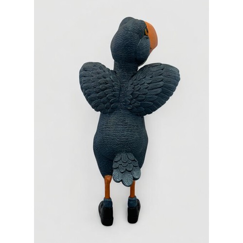 46 - Terry Webster (British, 1941-2024), 
Bird in Boots, 
Composite resin, 
37cm.