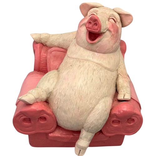 36 - Terry Webster (British, 1941-2024),
Pig on Chair, 
Composite resin, 
19cm.