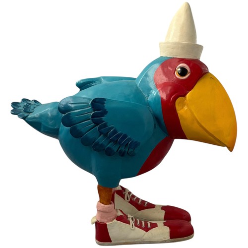 41 - Terry Webster (British, 1941-2024), 
Parrot in boots, 
Composite resin, 
43cm.