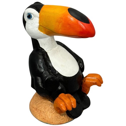 60 - Terry Webster (British, 1941-2024), 
Seated Toucan, 
Composite resin, 
24cm.