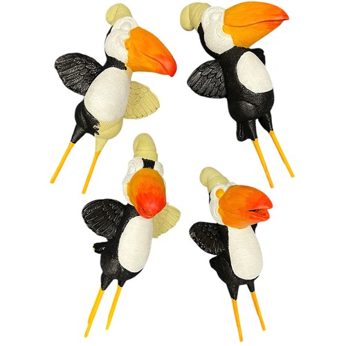 48 - Terry Webster (British, 1941-2024),
Unfinished Puffins, 
Composite resin, 
35cm. (4)