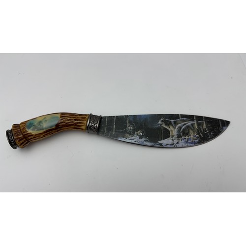 49 - Range of knives to include Indian waved blade dagger in sheath, African carved wooden knife with hea... 