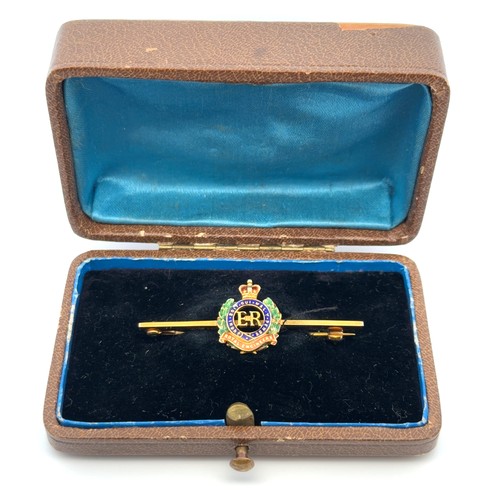 140 - A hallmarked Royal Engineers 9ct gold and ename; brooch. Pin also 9ct.