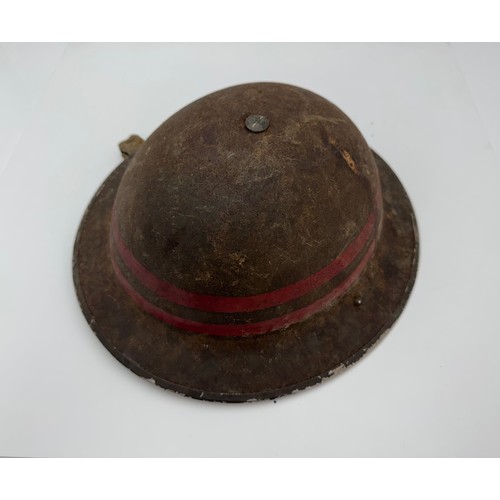 123 - Second World War National Fire Service (NFS) tin fire helmet, a dark green helmet having NFS transfe... 