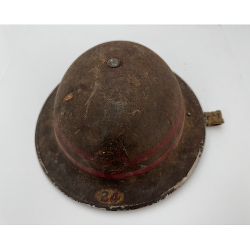 123 - Second World War National Fire Service (NFS) tin fire helmet, a dark green helmet having NFS transfe... 