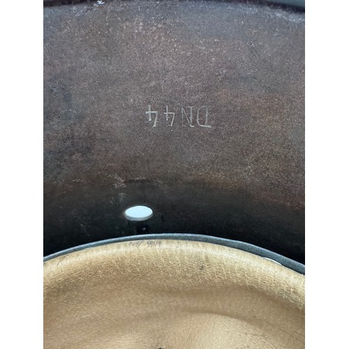 61 - WWII original German M40 steel combat helmet shell. Marked clearly NS66 to side inner rim, DN44 to b... 