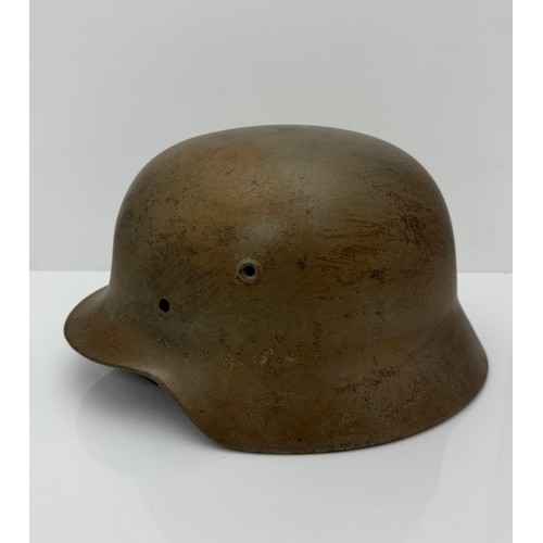 62 - A WWII Norwegian used  German M40 steel helmet clearly marked ET66 to side inner rim, 314 to back in... 