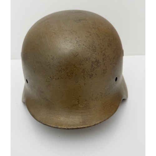 62 - A WWII Norwegian used  German M40 steel helmet clearly marked ET66 to side inner rim, 314 to back in... 