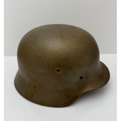 62 - A WWII Norwegian used  German M40 steel helmet clearly marked ET66 to side inner rim, 314 to back in... 