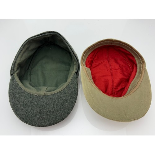 63 - Two reproduction WWII German caps. A reproduction  'SS' M43 field cap with good quality insignia, si... 