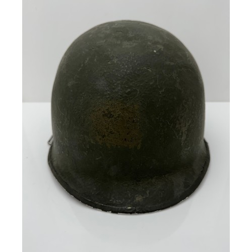 113 - A WWII US Military Schleuter steel helmet shell, front seam.  Swivel bail missing but with spares.